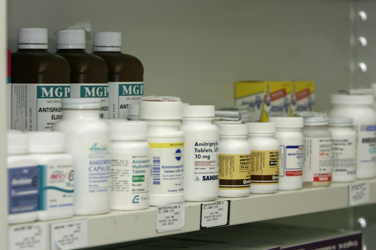 Shelves stocked with health and pharmacy products